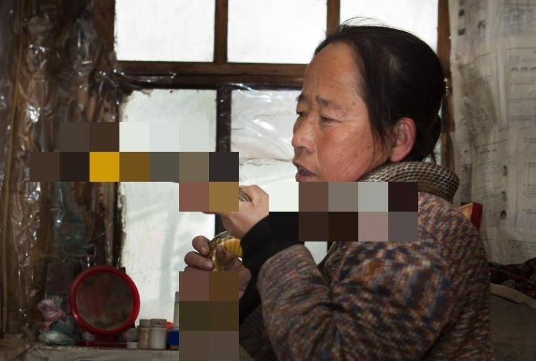 吉林农妇救了一条蛇,吉林农妇救毒蛇同吃同住12年