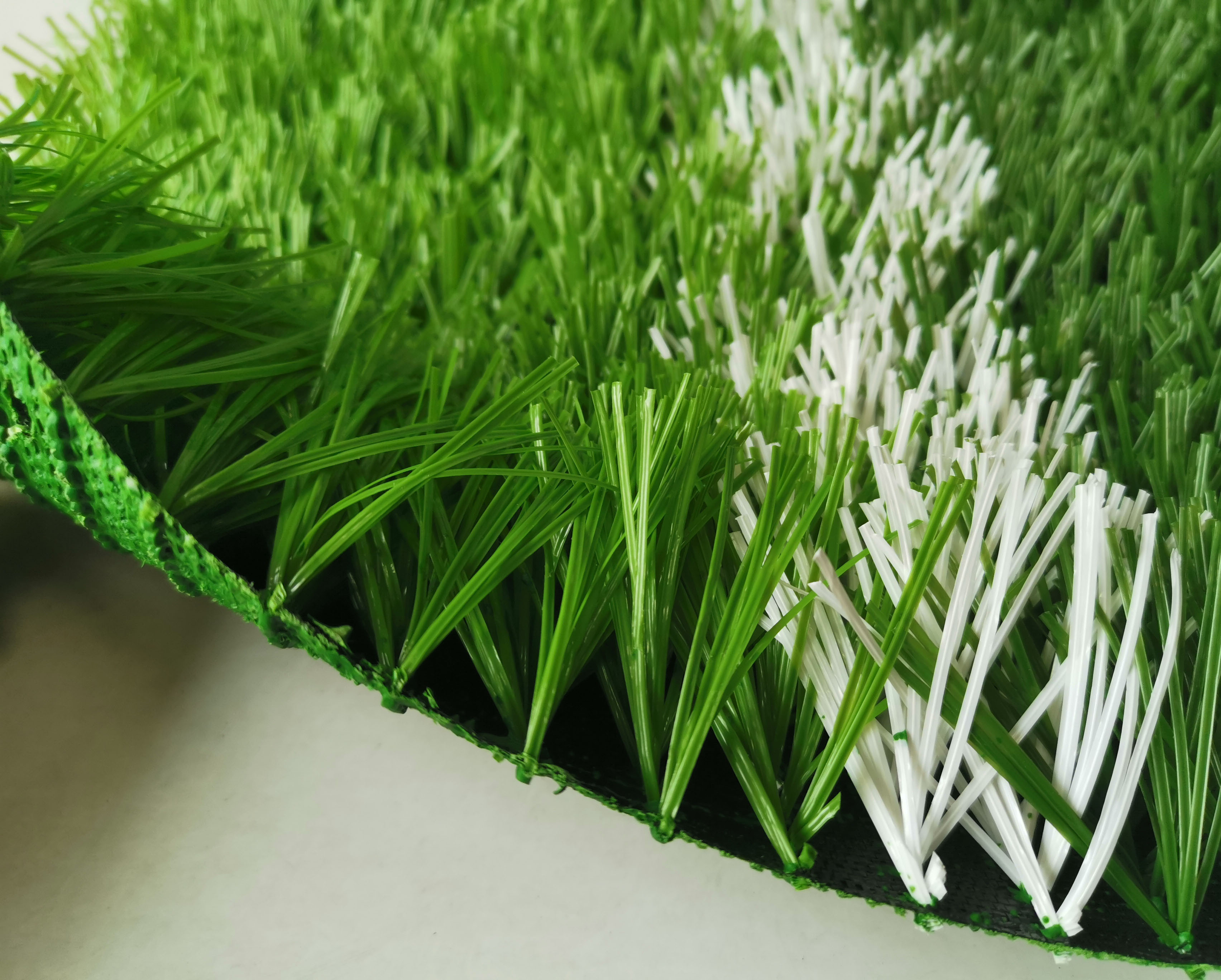 人造草坪足球场厂家施工单位,足球场人工草坪厂家最新介绍说明