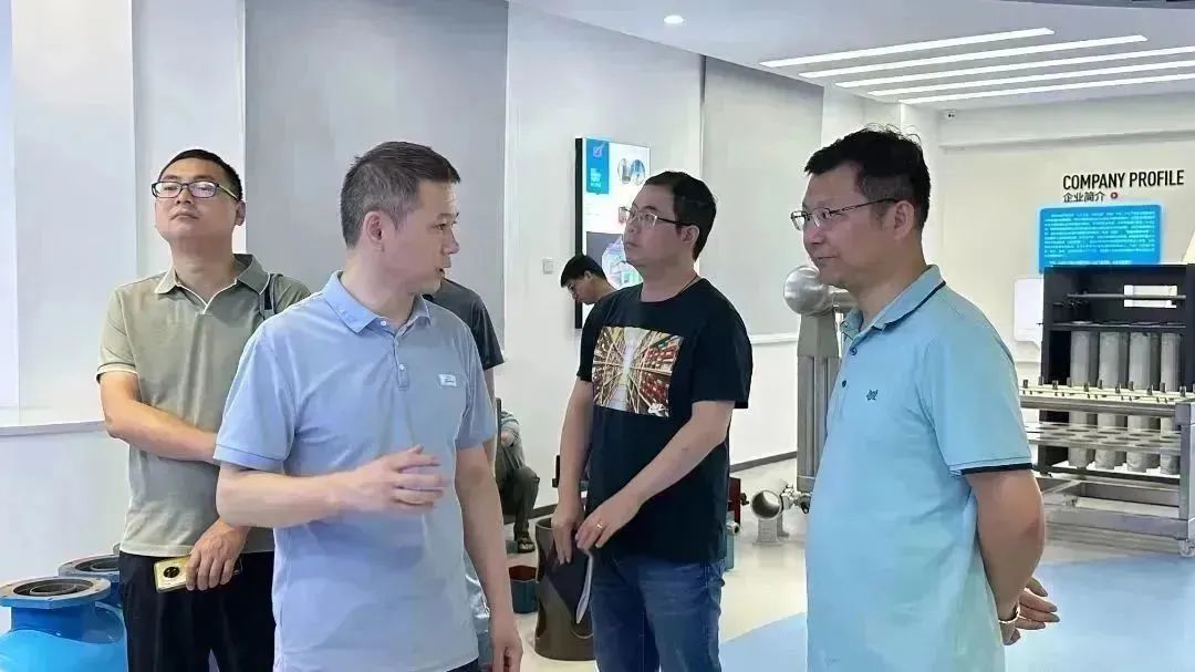 苏州东风精冲工程有限公司总经理喻华平一行莅临我司参观考察