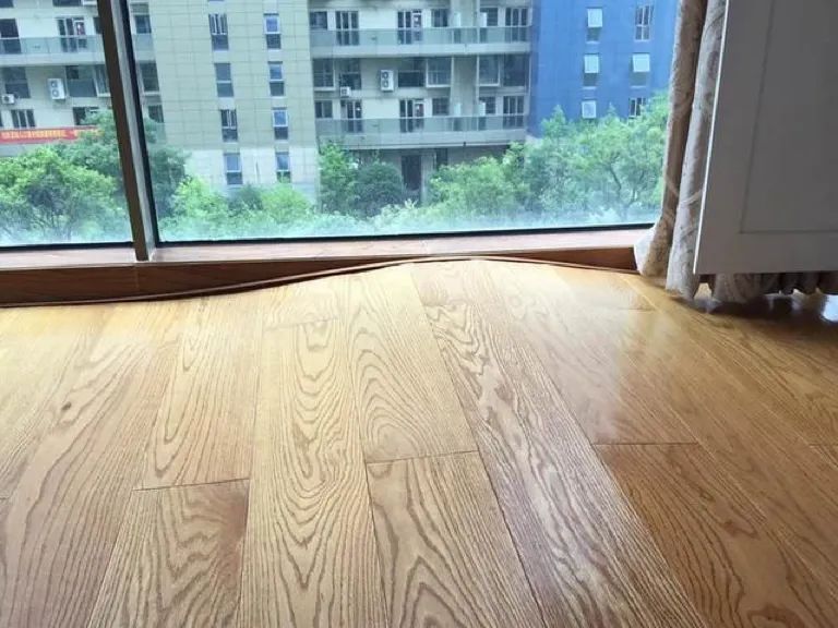 木地板通铺起拱能自己恢复吗,已经铺好的木地板不平怎么补救